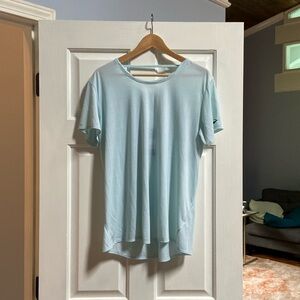 Light blue Brooks running top